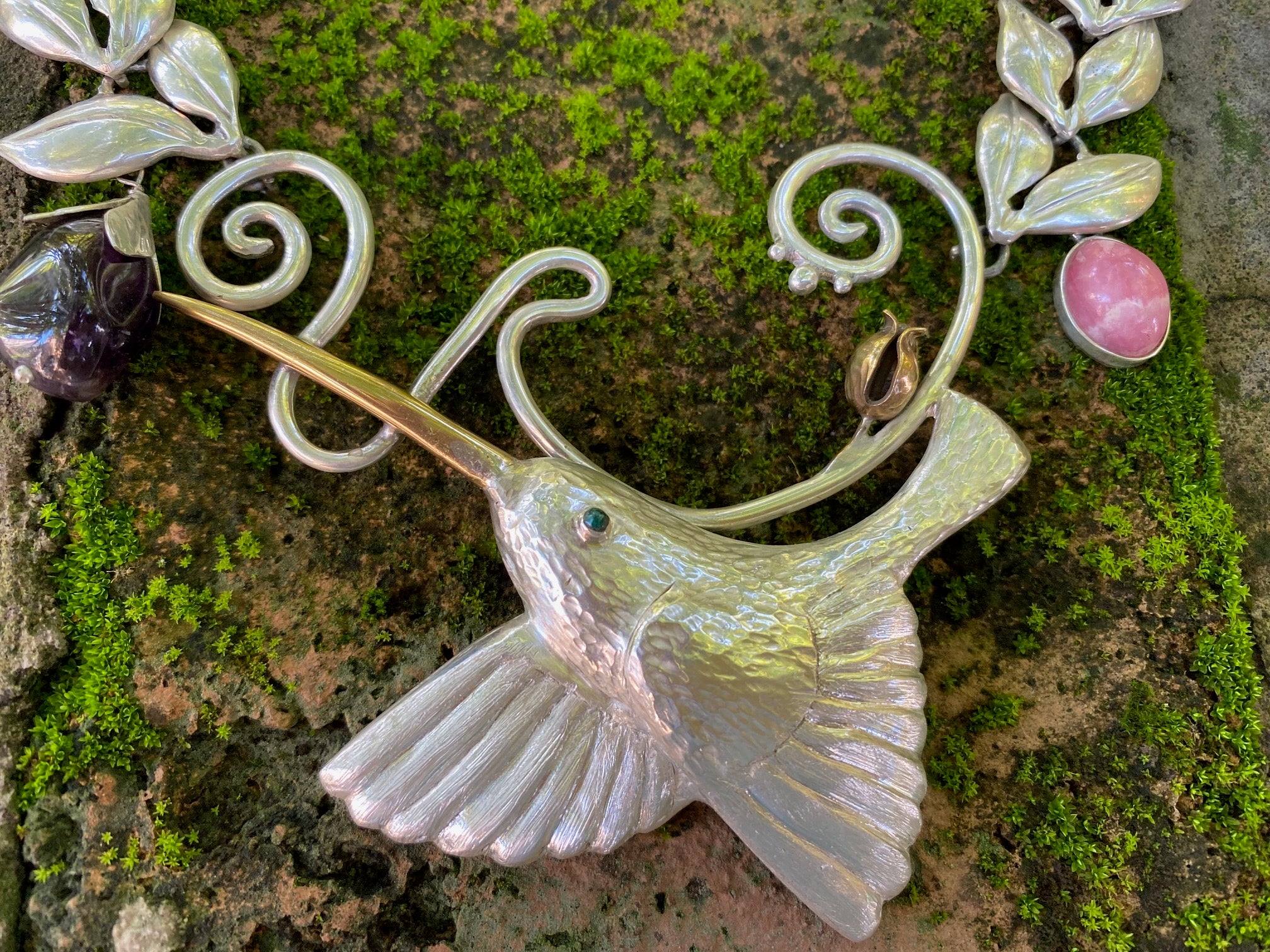 HAND REPOUSEE, SILVER HUMMING BIRD NECKLACE.