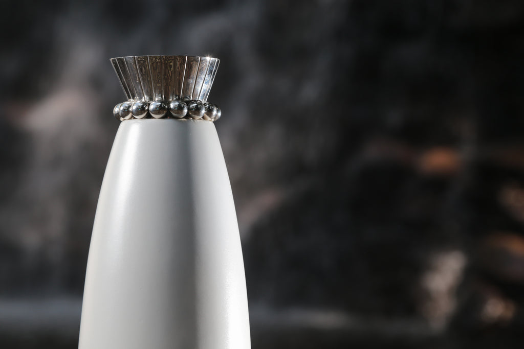 MOON GLOW , TALL WHITE PORCELAIN VASE.