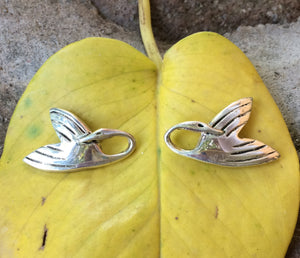 SWAN EARRINGS.
